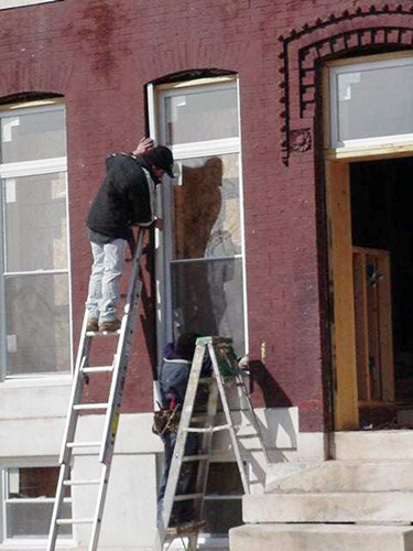 Contractors prepare home for to pass 100% rule