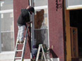 Contractors prepare a home to pass the state's 100 Percent Rule, part of Maryland's lead poisoning prevention laws