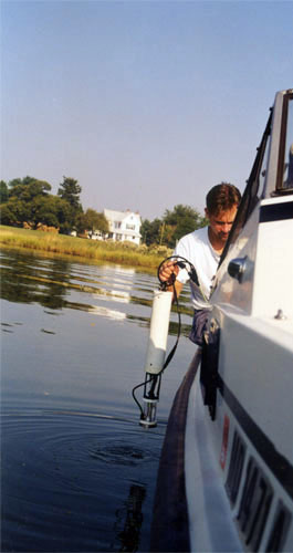 MDE employee sampling water