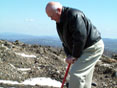 Photo of Secretary Philbrick Planting a Tree