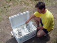 Man with open cooler