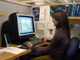   An environmental engineer in front of a computer