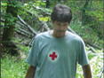 Man with red cross shirt