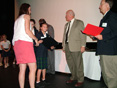 Students and adults at awards ceremony