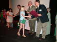 Students and adults at awards ceremony