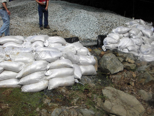 Sandbags line the leak site