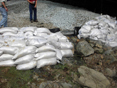 Sandbags line the leak site