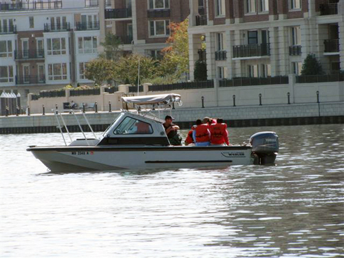 High School Students on a boat on World Water Monitoring Day