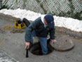 Bill Beatty inspecting end-of-line manhole adjacent to Furnace Creek (and raising the bar of expectation for his field crew!)