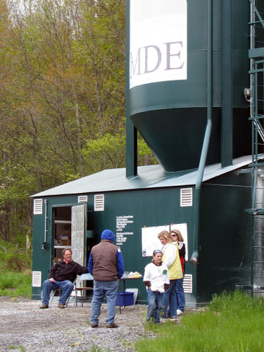 The Crellin Lime Doser. Joe Mills, MDE project leader and tour guide at the doser, is seated.