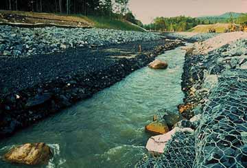 gabion baskets lining a waterway